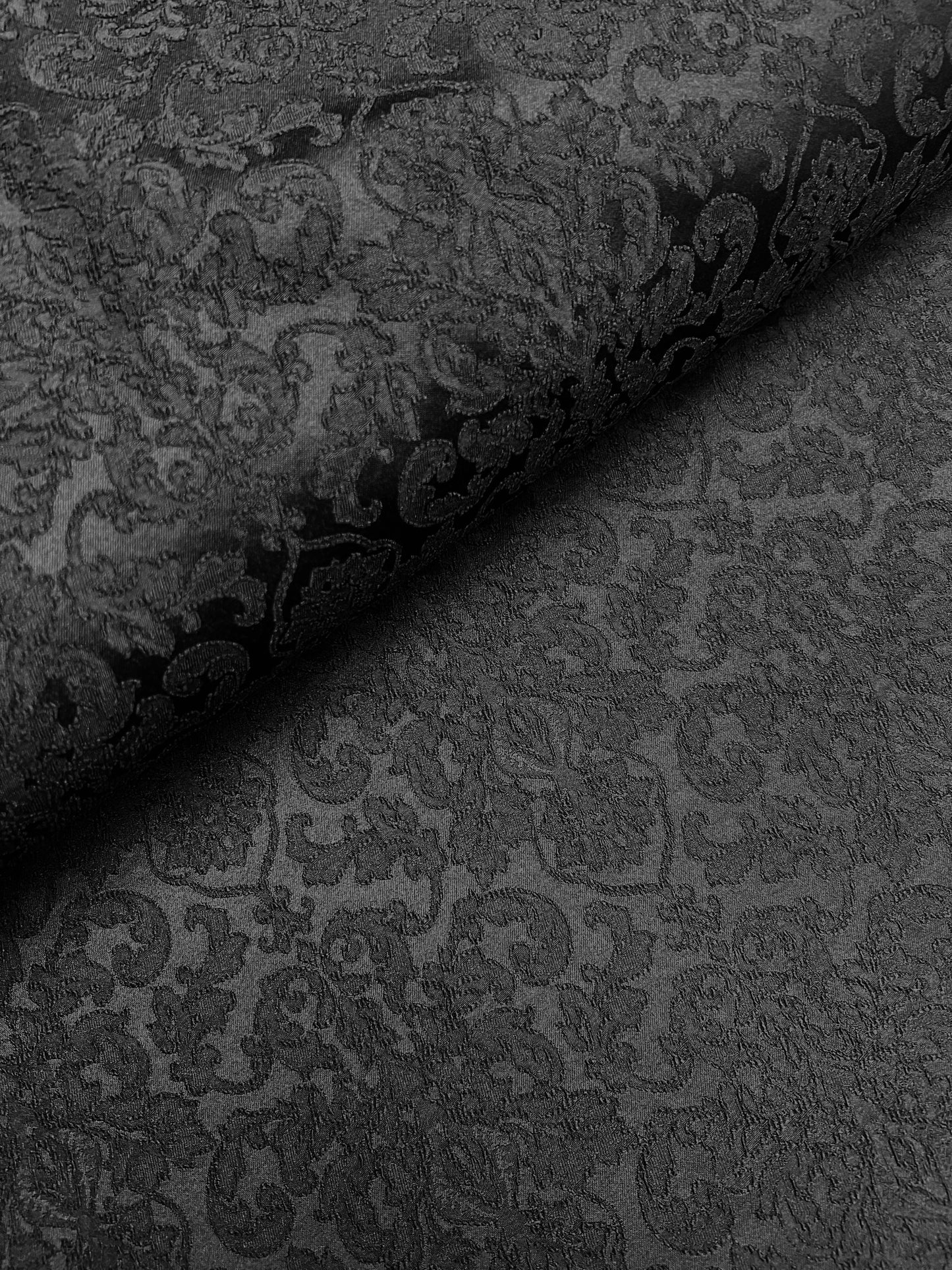 Black embossed polyester